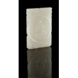 A good Chinese carved white jade rectangular plaque or pendant, carved to one side with a seated