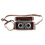 Property of a lady - an Iloca Stereo II camera, in tan leather case.