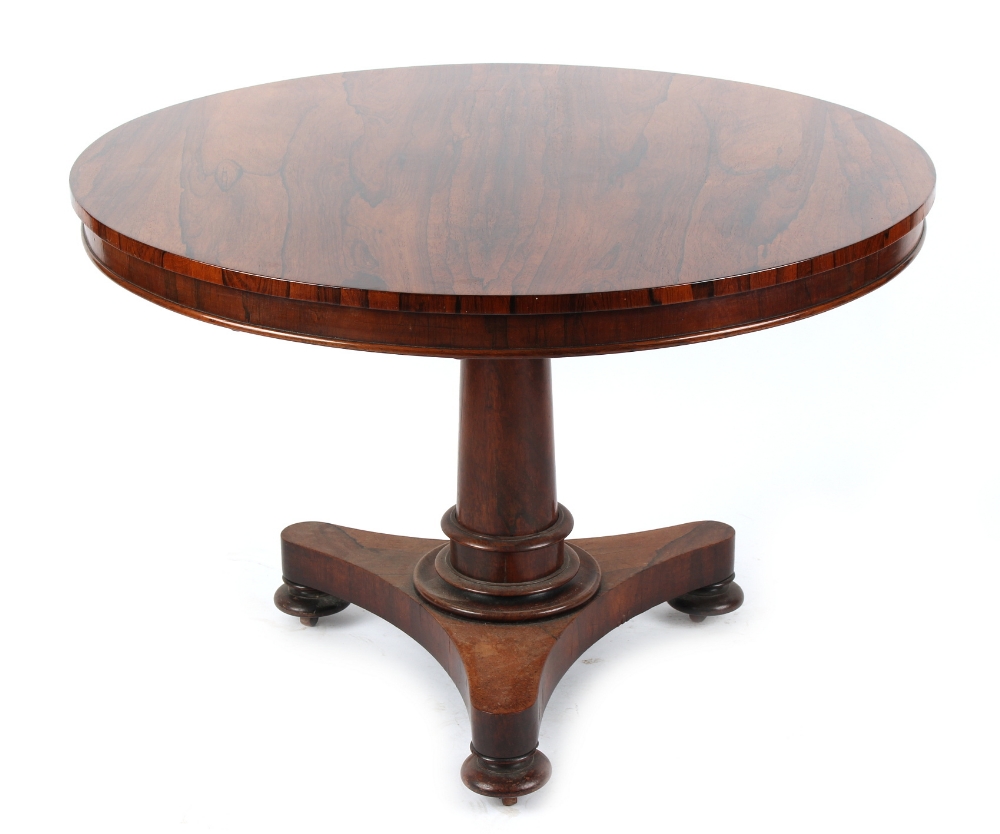 Property of a gentleman - an early Victorian rosewood circular tilt-top breakfast table, with turned