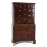 Property of a deceased estate - a George III mahogany tallboy or chest-on-chest with brass swan neck