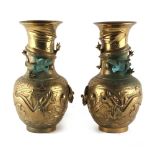 Property of a gentleman - a pair of early 20th century Oriental bronze vases with dragon