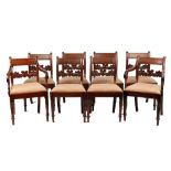 A set of eight early 19th century George IV mahogany dining chairs including two carvers (8).