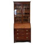 Property of a deceased estate - a George III mahogany bureau with later associated astragal glazed