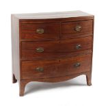 Property of a lady - an early 19th century Regency period mahogany bow-fronted chest of two