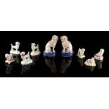Property of a lady - a collection of eight 19th century Staffordshire porcelain & pottery models