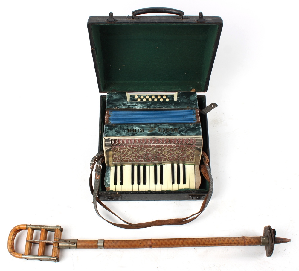 Property of a deceased estate - a bamboo shooting stick; together with a cased Black Bird piano