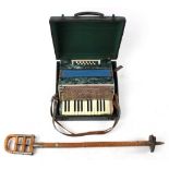 Property of a deceased estate - a bamboo shooting stick; together with a cased Black Bird piano