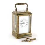 Property of a gentleman - a late 19th century brass cased carriage clock, with blue decorations to