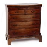 Property of a deceased estate - a George III mahogany chest of two short & three long graduated