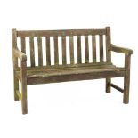 Property of a deceased estate - a well weathered teak garden bench, 47.5ins. (121cms.) long.