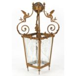 A late 19th / early 20th century Continental gilt painted metal hall lantern of square tapering