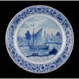 Property of a deceased estate - a mid 18th century Dutch Delft blue & white plate, painted with a