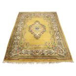 Property of a gentleman - an Indian hand knotted wool carpet with pale yellow ground, 143 by 108ins.