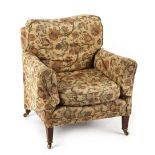 Property of a deceased estate - an Edwardian Howard Dutton armchair, with square tapering front legs