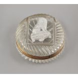 Property of a lady - a 19th century glass circular box, the cover decorated with a sulphide cameo