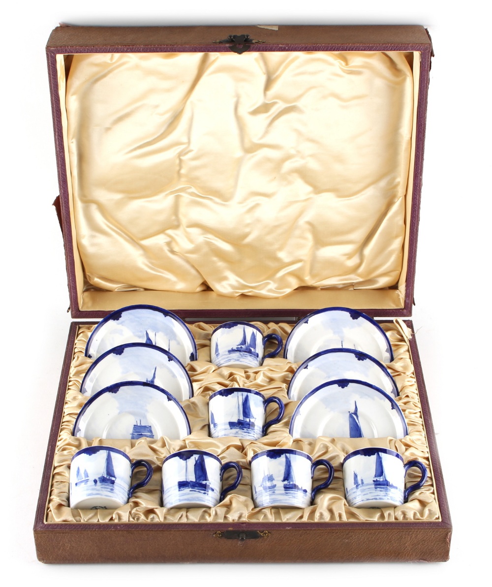 Property of a lady - a set of six early 20th century Royal Crown Derby blue & white coffee cans &