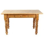 Property of a gentleman - a pine kitchen table with frieze drawer, 54ins. (137cms.) long.