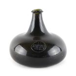 Property of a lady - a good named & dated sealed onion wine bottle, the circular seal inscribed '