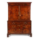 Property of a deceased estate - a late 17th century figured walnut & feather banded two-door cabinet