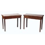 Property of a lady - a near pair of 18th century George III mahogany tea and card tables, with