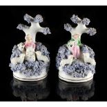 Property of a lady - a pair of mid 19th century Staffordshire porcelain models of a shepherd and