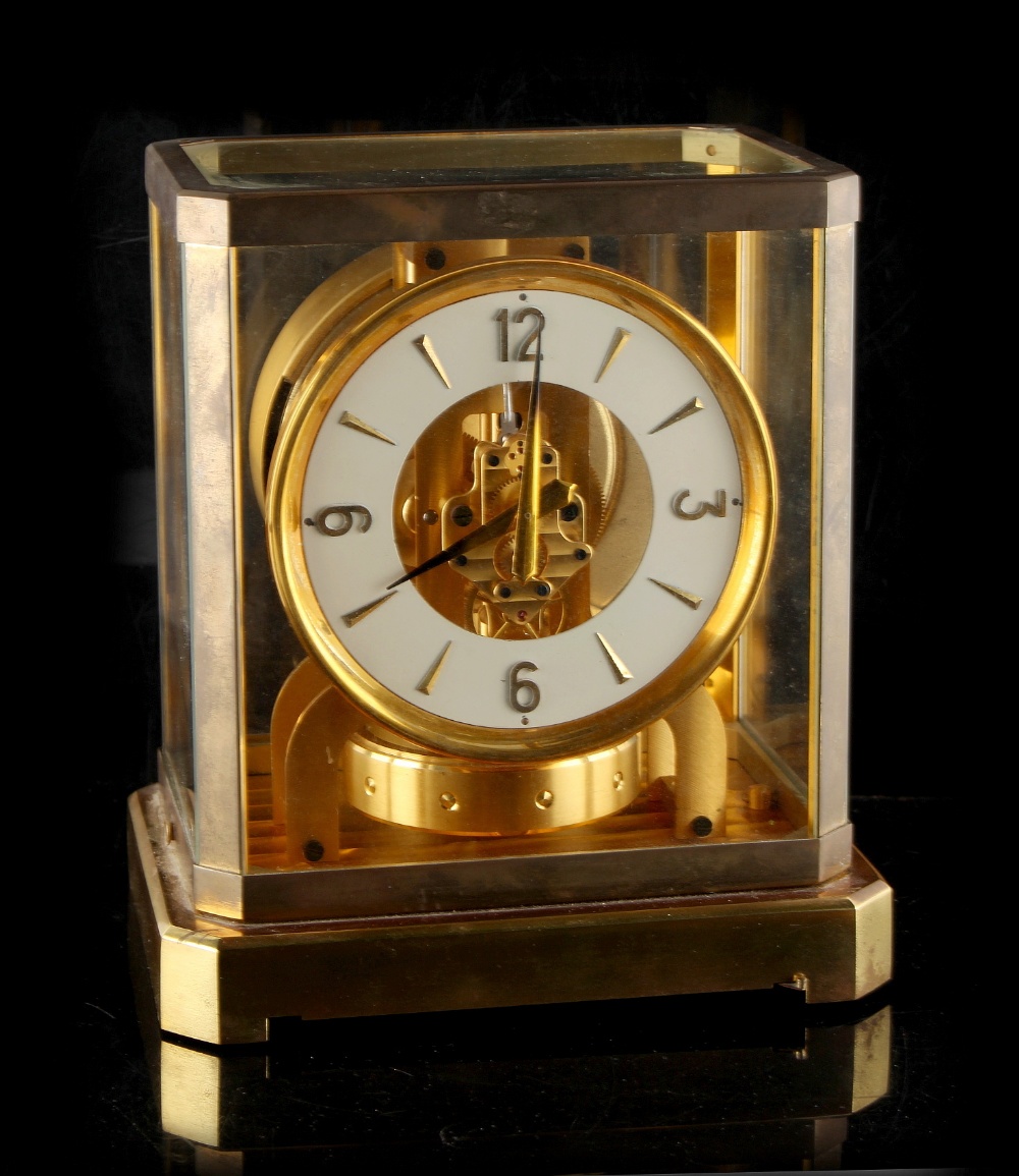 Property of a lady - a Jaeger Le Coultre Atmos clock, numbered 33210, 9.25ins. (23.5cms.) high.