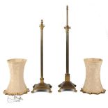 Property of a lady - two similar Edwardian Corinthian column adjustable lamp standards, with