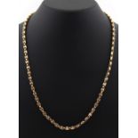 Property of a lady - a 9ct gold fancy link chain necklace, with safety chain, approximately 13.7