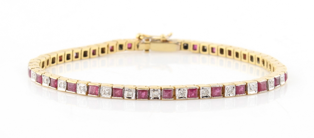 An 18ct yellow gold ruby & diamond box link bracelet, the square cut rubies weighing an estimated