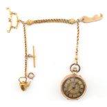 Property of a deceased estate - a 14ct gold fob watch, on an unmarked fancy yellow metal chain
