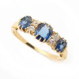 Property of a gentleman - a late 19th / early 20th century yellow gold sapphire & diamond seven