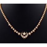 A Victorian unmarked yellow metal pearl necklace, with round & star shaped links each set with a