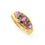 A Victorian 15ct yellow gold amethyst & emerald ring, size M.