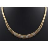 Property of a lady - a 9ct three colour gold necklace, 16ins. (40.5cms.) long, approximately 33.2