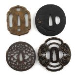 A collection of Japanese tsubas, 18th and 19th century, mixed metals - four assorted tsubas (4).