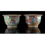 Property of a lady - a pair of 19th century Chinese Canton famille rose planters, each 10.75ins. (