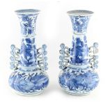 Property of a lady - a pair of Chinese blue & white porcelain bottle vases with frill handles, the