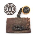 Property of a lady - a late 19th / early 20th century Japanese leather tobacco pouch, with