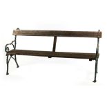 Property of a deceased estate - a green painted cast iron & slatted wood garden bench, 71.25ins. (