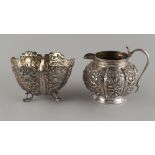 Property of a lady of title - a late 19th / early 20th century Indian white metal cream jug and