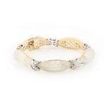 A good Art Deco style 18ct two colour gold rock crystal & diamond bracelet, French marks to clasp