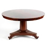 Property of a gentleman - an early 19th century William IV rosewood circular tilt-top dining