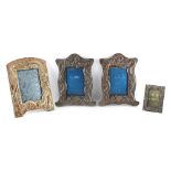 Property of a lady - a pair of late 19th / early 20th century Japanese metal photograph frames, each