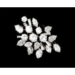 Cartier - a very fine 18ct white gold diamond floral brooch, with round brilliant cut, tapering
