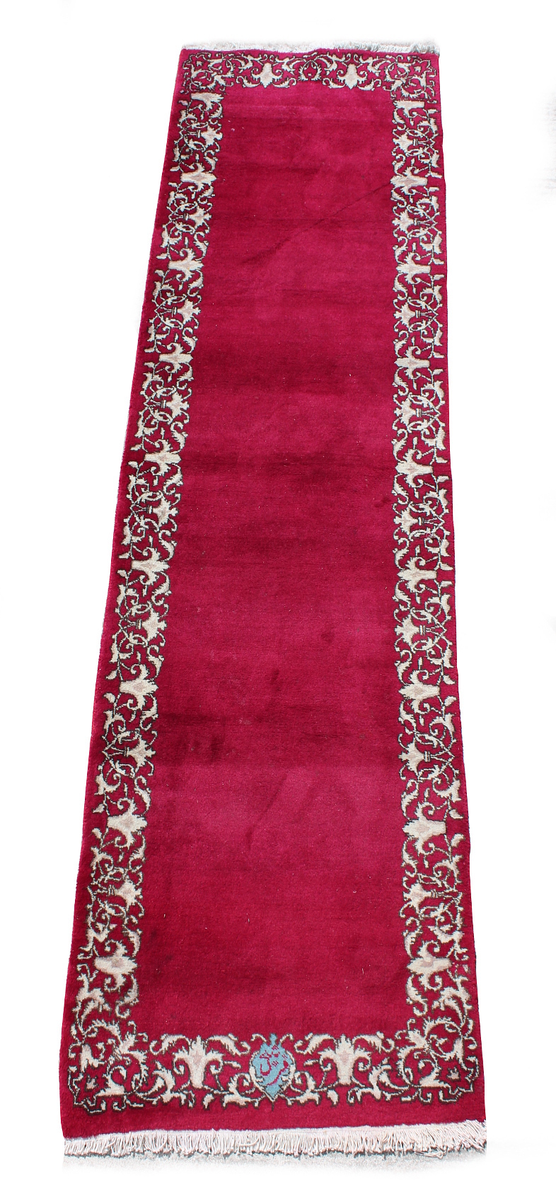 A Tabriz woollen hand-made runner with burgundy ground, 124 by 32ins. (315 by 80cms.).