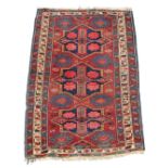 Property of a deceased estate - an early 20th century Shirvan rug, 64 by 44ins. (162 by 112cms.).