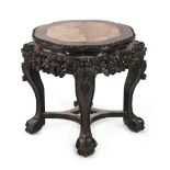 Property of a lady - a late 19th / early 20th century Chinese carved hongmu stand with pink marble