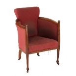 Property of a gentleman - an Arts & Crafts oak tub chair, with red upholstery.