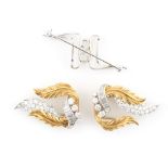 Van Cleef & Arpels - a pair of 18ct yellow & white gold diamond leaf clips, joining with frame to