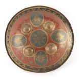 Property of a gentleman - a late 19th century Indian brass small shield, dhal, with four